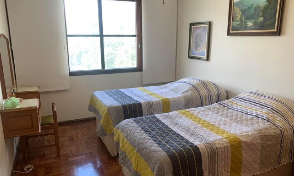 Apartamento de três dormitórios 