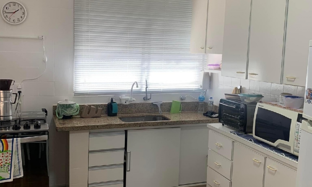 Apartamento de três dormitórios 