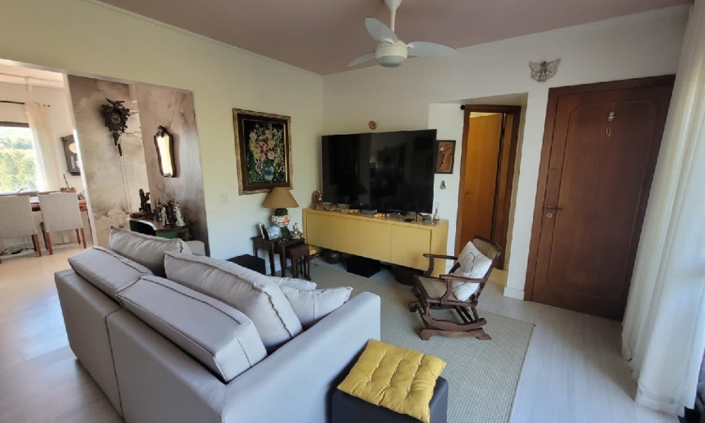 Apartamento de três dormitórios 