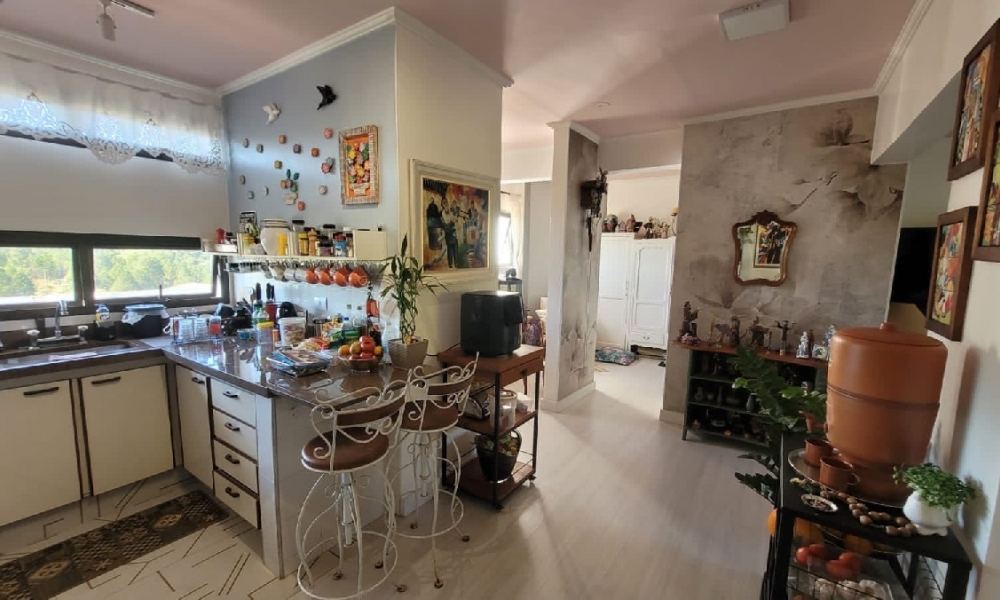 Apartamento de três dormitórios 