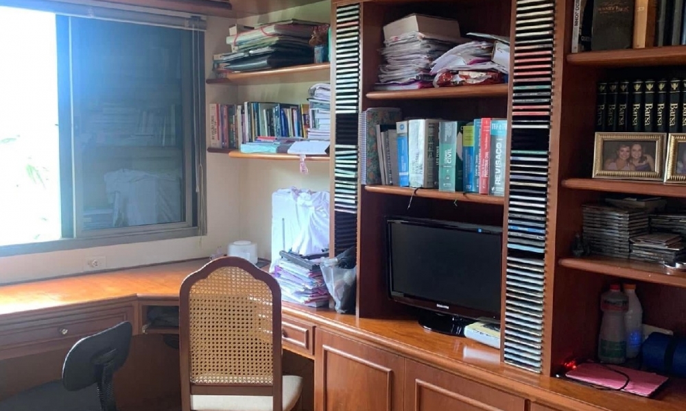 Apartamento de três dormitórios 
